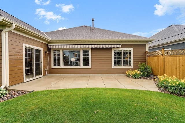 8713 9th Pl N, Lake Elmo, MN 55042 - back of property with a patio and a shingled roof