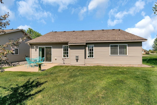 223 Glenview Loop, Saint Cloud, MN 56303 - rear view of house featuring a patio, roof with shingles, and a lawn