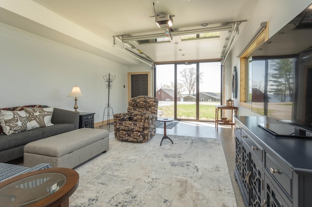 3391 Little Ida Beach Rd NW, Alexandria, MN 56308 - living area featuring concrete flooring and healthy amount of natural light