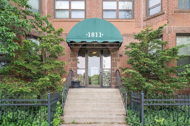 1811 Elliot Ave Unit 2, Minneapolis, MN 55404 - doorway to property featuring brick siding