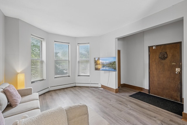 1811 Elliot Ave Unit 2, Minneapolis, MN 55404 - living area with plenty of natural light, wood finished floors, and baseboards