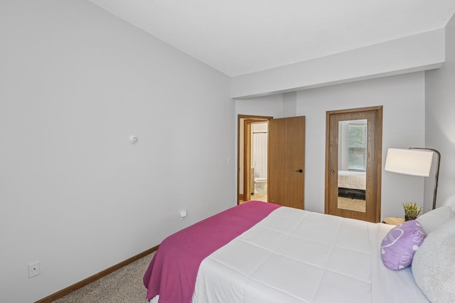 1811 Elliot Ave Unit 2, Minneapolis, MN 55404 - bedroom featuring carpet flooring, connected bathroom, and baseboards
