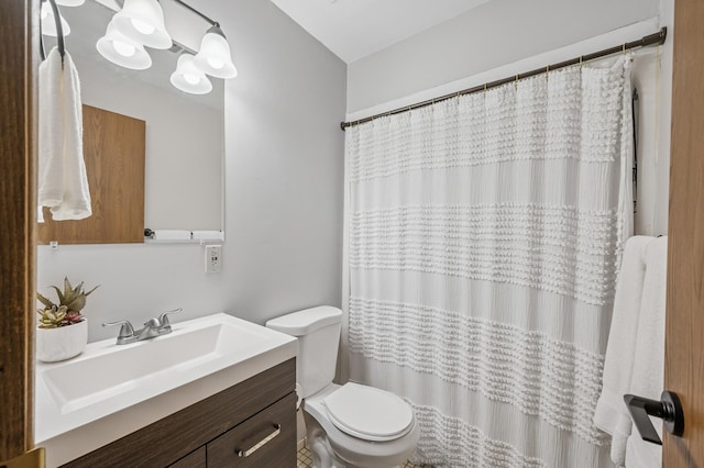 1811 Elliot Ave Unit 2, Minneapolis, MN 55404 - full bathroom featuring vanity, toilet, and curtained shower