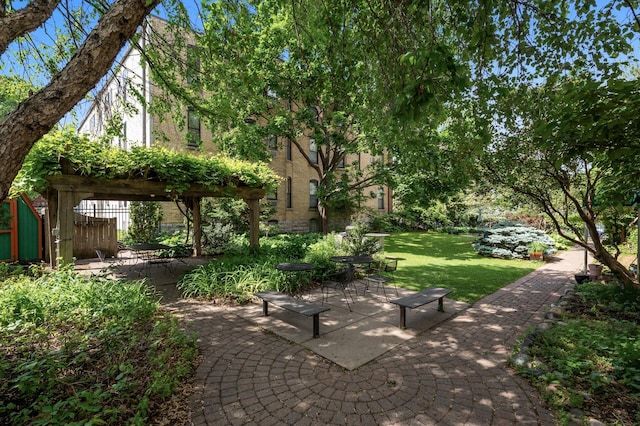 1811 Elliot Ave Unit 2, Minneapolis, MN 55404 - view of green lawn featuring a patio