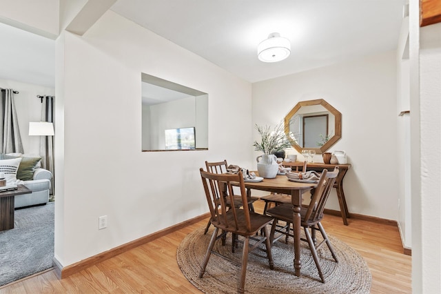 13501 Heather Hills Dr, Burnsville, MN 55337 - dining space featuring light wood-style flooring and baseboards