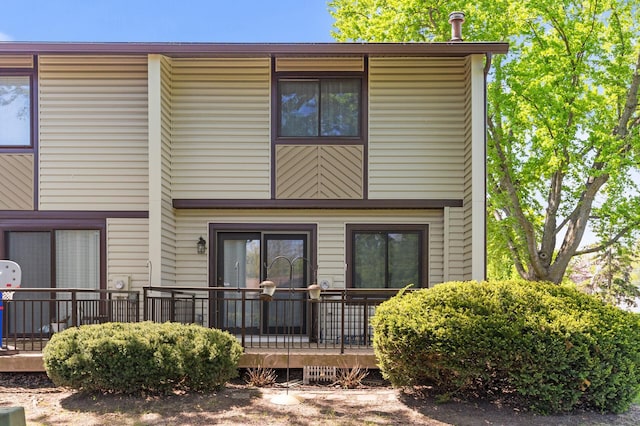 13501 Heather Hills Dr, Burnsville, MN 55337 - back of property featuring a deck