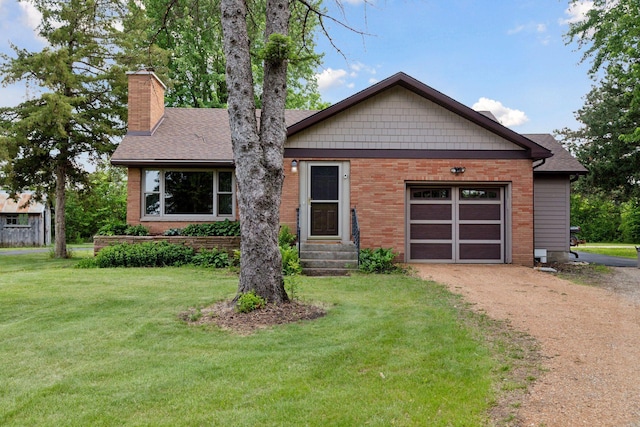 14530 Jonathan Carver Pkwy, Carver, MN 55315 - ranch-style house with a chimney, driveway, a front yard, and brick siding