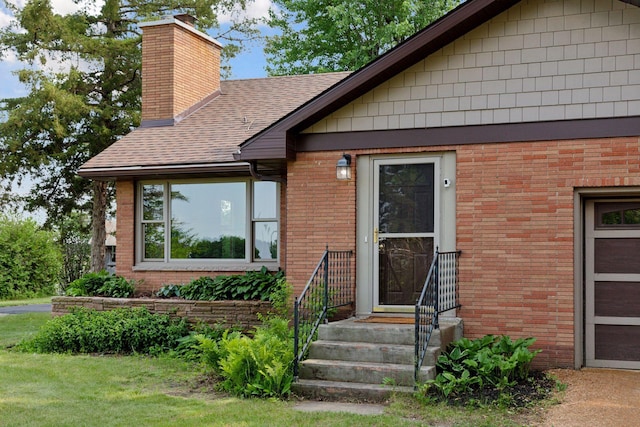 14530 Jonathan Carver Pkwy, Carver, MN 55315 - view of front of home with brick siding, a chimney, and a shingled roof