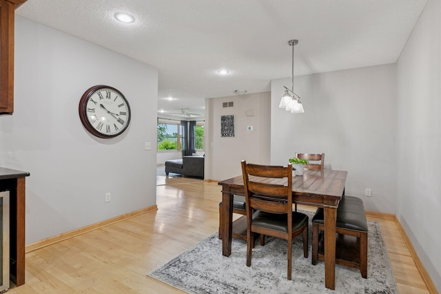 14530 Jonathan Carver Pkwy, Carver, MN 55315 - dining area with light wood finished floors, baseboards, and recessed lighting