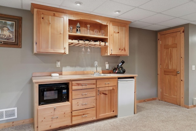 14530 Jonathan Carver Pkwy, Carver, MN 55315 - indoor wet bar with black microwave, baseboards, light carpet, and a drop ceiling