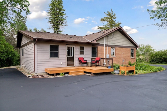 14530 Jonathan Carver Pkwy, Carver, MN 55315 - back of property with a wooden deck