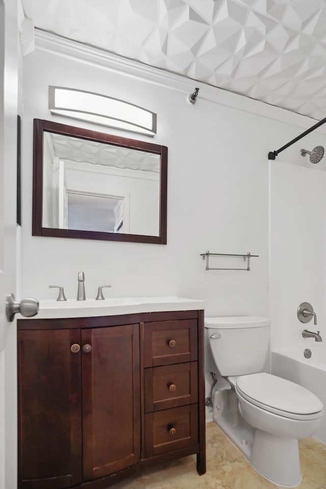 bathroom with vanity, toilet, bathtub / shower combination, and crown molding