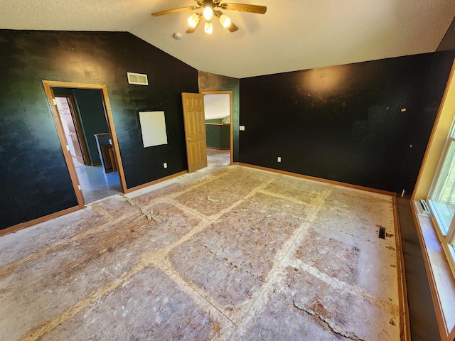 3458 Savannah Ave, White Bear Lake, MN 55110 - empty room with vaulted ceiling, ceiling fan, and baseboards