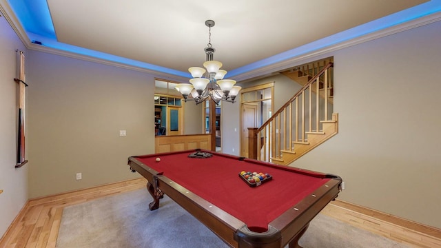 game room with wood finished floors, a chandelier, pool table, and baseboards