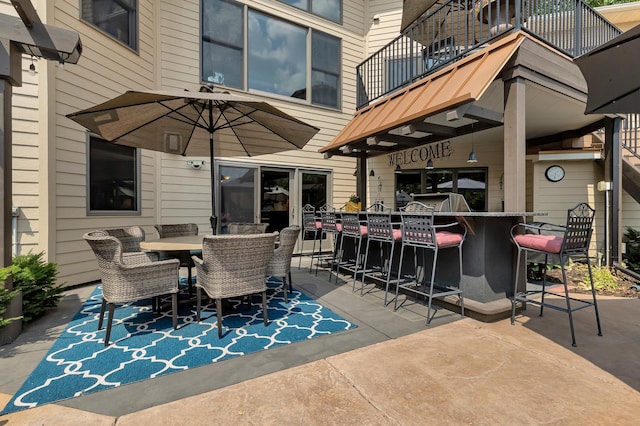 2255 Chelmsford Ln, Saint Cloud, MN 56301 - view of patio with a balcony