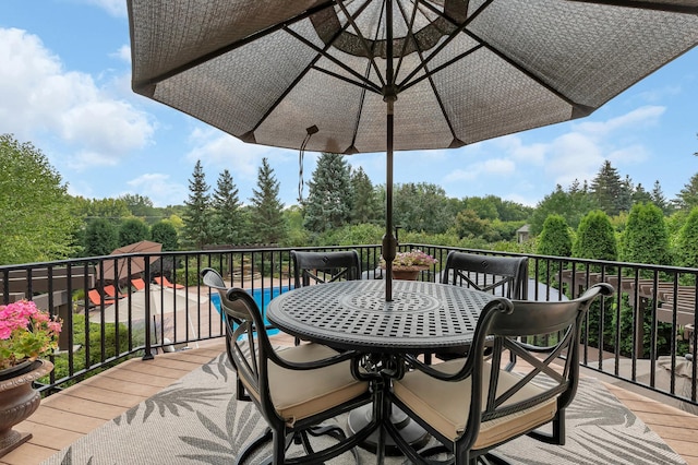 2255 Chelmsford Ln, Saint Cloud, MN 56301 - deck with outdoor dining area