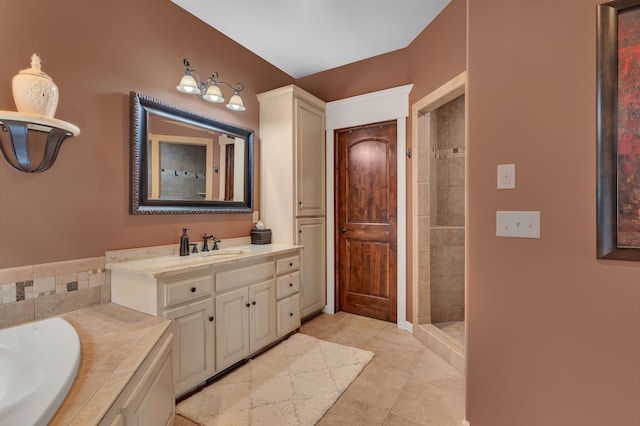 2255 Chelmsford Ln, Saint Cloud, MN 56301 - bathroom with vanity, a tile shower, and tile patterned floors