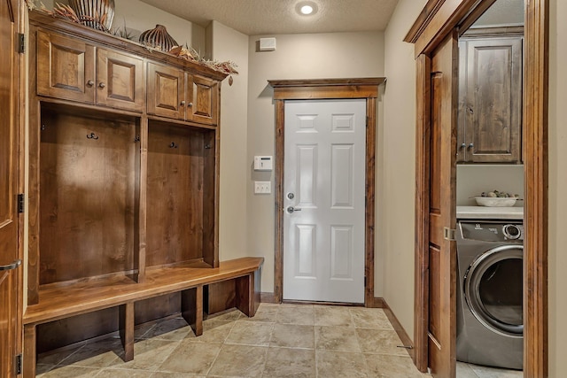 2255 Chelmsford Ln, Saint Cloud, MN 56301 - mudroom with washer / dryer, a textured ceiling, and baseboards