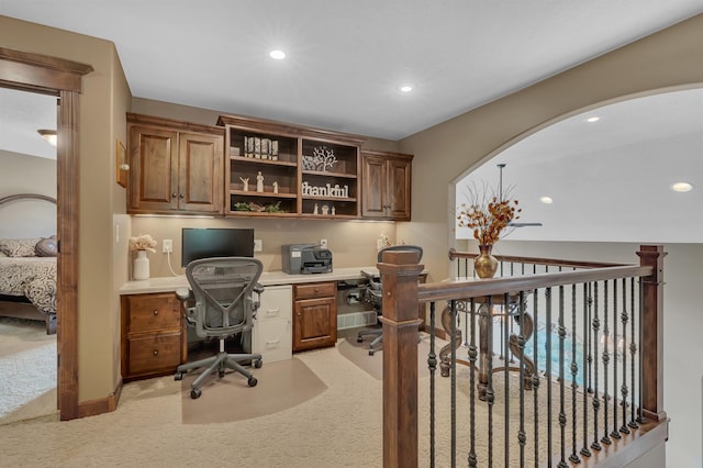 2255 Chelmsford Ln, Saint Cloud, MN 56301 - office featuring built in desk, light carpet, recessed lighting, and arched walkways