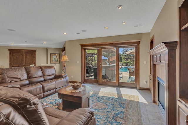 2255 Chelmsford Ln, Saint Cloud, MN 56301 - living area featuring baseboards, recessed lighting, light carpet, and a fireplace with flush hearth
