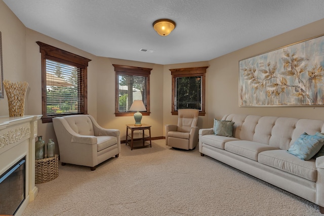 2255 Chelmsford Ln, Saint Cloud, MN 56301 - living room with light colored carpet, a fireplace, and baseboards