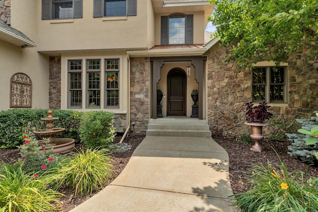 2255 Chelmsford Ln, Saint Cloud, MN 56301 - view of exterior entry with stone siding and stucco siding