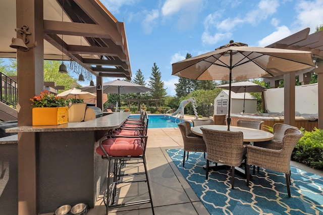 2255 Chelmsford Ln, Saint Cloud, MN 56301 - view of patio with an outdoor pool
