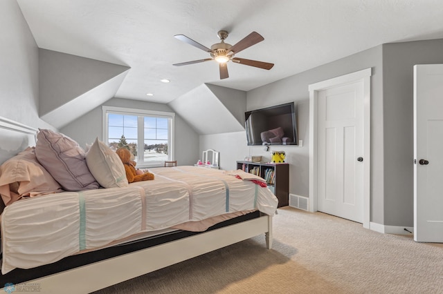 bedroom with baseboards, light colored carpet, lofted ceiling, a ceiling fan, and recessed lighting