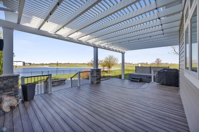 wooden terrace featuring a water view, a pergola, fence, a covered hot tub, and grilling area