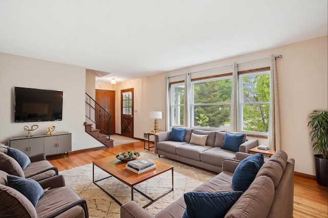 3529 Jerry St, White Bear Lake, MN 55110 - living area featuring stairs and light wood-style floors