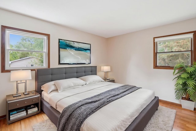 3529 Jerry St, White Bear Lake, MN 55110 - bedroom with light wood finished floors and baseboards