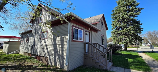 304 1st Ave E, Halstad, MN 56548 - view of home's exterior featuring a yard