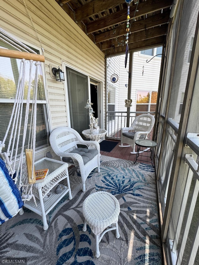 2231 Penn Pl Unit 114, North Saint Paul, MN 55109 - view of patio / terrace with a balcony