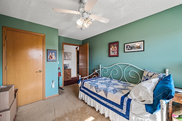 2231 Penn Pl Unit 114, North Saint Paul, MN 55109 - carpeted bedroom with a textured ceiling and a ceiling fan
