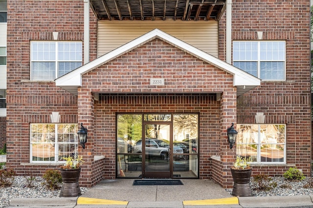 2231 Penn Pl Unit 114, North Saint Paul, MN 55109 - entrance to property featuring brick siding