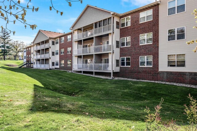 2231 Penn Pl Unit 114, North Saint Paul, MN 55109 - view of apartment building / complex