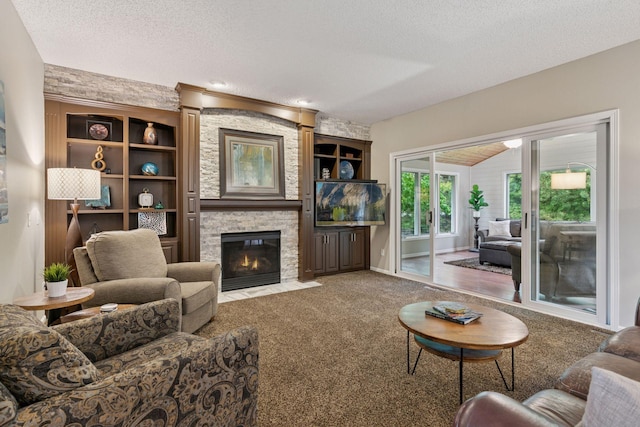 13148 Crolly Ct, Rosemount, MN 55068 - living room with a textured ceiling, a fireplace, carpet, and built in shelves