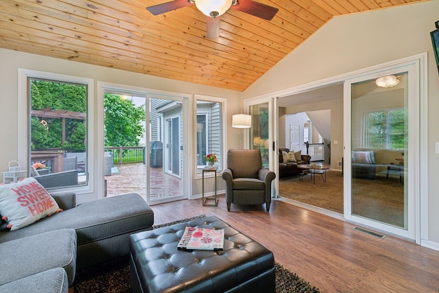 13148 Crolly Ct, Rosemount, MN 55068 - living area featuring lofted ceiling, healthy amount of natural light, wooden ceiling, a ceiling fan, and wood finished floors