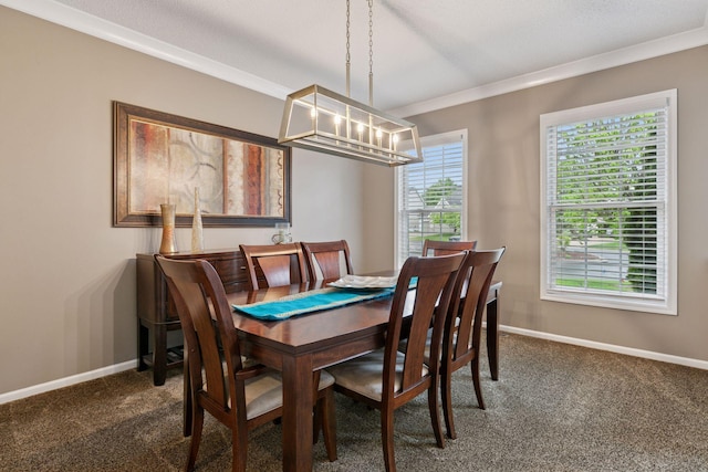 13148 Crolly Ct, Rosemount, MN 55068 - dining room featuring ornamental molding, dark carpet, a chandelier, and baseboards