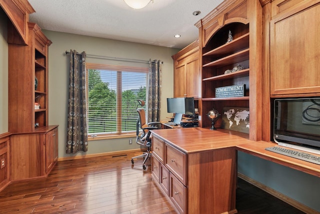13148 Crolly Ct, Rosemount, MN 55068 - home office featuring baseboards, wood finished floors, a textured ceiling, and recessed lighting