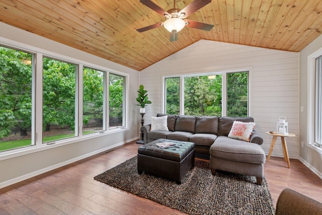 13148 Crolly Ct, Rosemount, MN 55068 - living room with lofted ceiling, wooden ceiling, baseboards, a ceiling fan, and wooden walls
