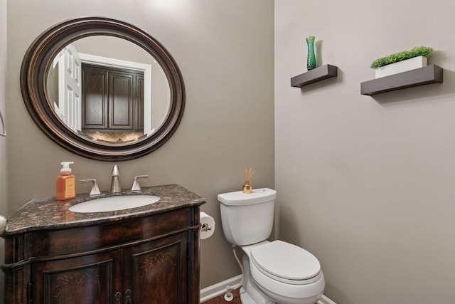 13148 Crolly Ct, Rosemount, MN 55068 - half bathroom featuring vanity, toilet, and baseboards