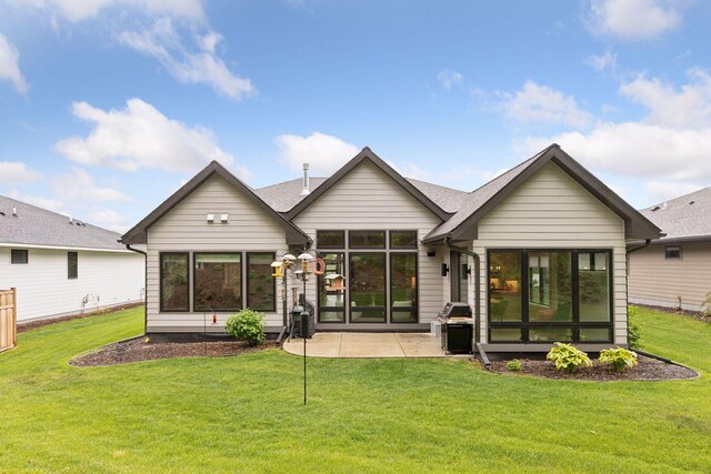 16798 Stirrup Ln, Eden Prairie, MN 55347 - rear view of property featuring a patio area and a lawn