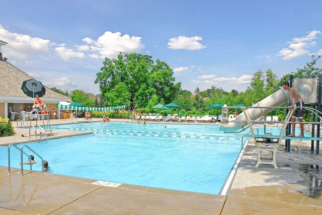 16798 Stirrup Ln, Eden Prairie, MN 55347 - community pool with a water slide and a patio