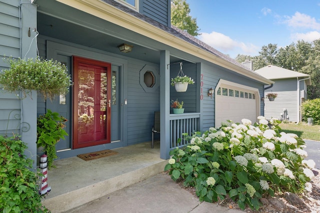 7010 Tartan Curv, Eden Prairie, MN 55346 - doorway to property with a garage and covered porch