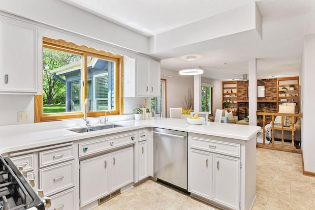 7010 Tartan Curv, Eden Prairie, MN 55346 - kitchen with appliances with stainless steel finishes, a peninsula, healthy amount of natural light, and light countertops
