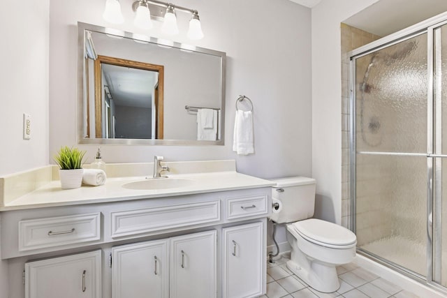 7010 Tartan Curv, Eden Prairie, MN 55346 - bathroom with a shower stall, vanity, and tile patterned floors