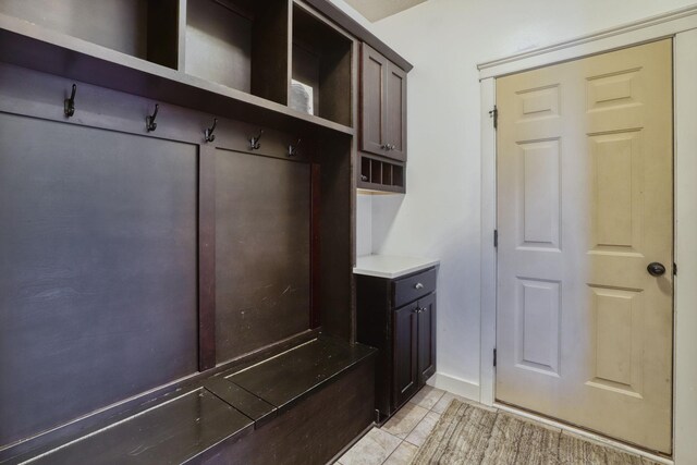 1730 Deephaven Dr, Woodbury, MN 55129 - mudroom with light tile patterned floors