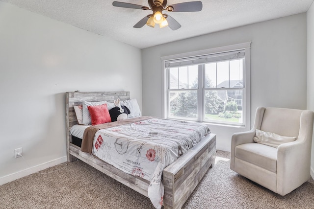 1730 Deephaven Dr, Woodbury, MN 55129 - bedroom with carpet flooring, baseboards, a textured ceiling, and a ceiling fan