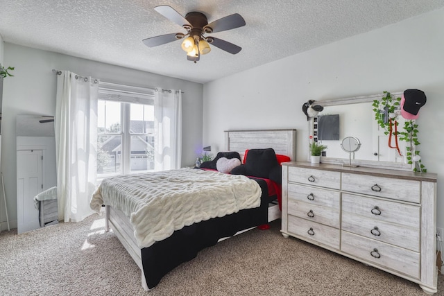1730 Deephaven Dr, Woodbury, MN 55129 - bedroom with carpet floors, a textured ceiling, and a ceiling fan